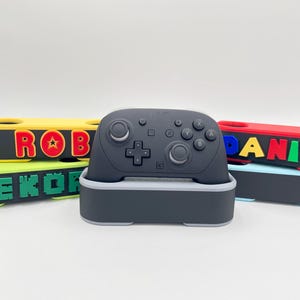 Support pour contrôleur | Compatible avec Switch 2 Pro | Station d&#39;accueil pour contrôleur de jeu vidéo | Décoration de jeu | Cadeau de jeu personnalisé | Décoration de salle de jeux personnalisée | Présentoir