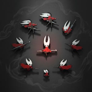 Puede incluir: Broches de esmalte que representan un personaje con cabeza blanca, capa roja y piernas negras. Los broches están dispuestos en un patrón circular sobre un fondo oscuro con un diseño ahumado. Algunos broches sostienen armas.
