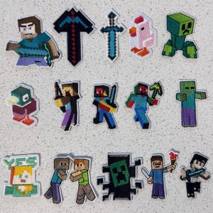 May include: A collection of fifteen embroidered patches featuring pixelated characters, tools, and creatures from a video game. The set includes figures like Steve, a Creeper, a chicken, a zombie, and various swords, all rendered in vibrant colours.
