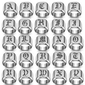 May include: Silver-toned rings, each featuring a different letter of the alphabet in an ornate, gothic-style font. The rings have a wide band and a flat, rectangular face with the letter engraved.