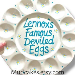 May include: A white ceramic mug with a black handle and the text "But First, Coffee" in a handwritten style. The mug is likely 11 ounces in size, perfect for a morning beverage.