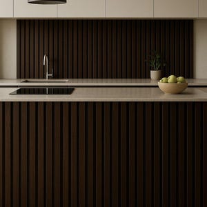 May include: Modern kitchen design featuring dark brown vertical wood paneling on the cabinets and backsplash. A light-colored countertop contrasts with the dark wood. A black pendant light hangs above the island. A bowl of green apples sits on the counter.
