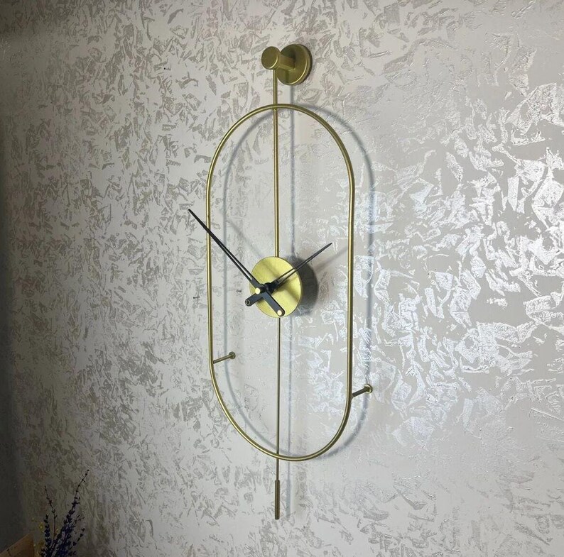 Modern Gold Metal Wall Clock With Pendulum | Minimalist Vertical Wall ...