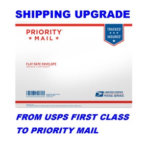 May include: A white Priority Mail flat rate envelope with a red and blue border. The envelope has a USPS logo and the text "TRACKED***INSURED" in a blue star-shaped seal. The text "FROM USPS FIRST CLASS TO PRIORITY MAIL" is printed in blue at the bottom of the envelope.
