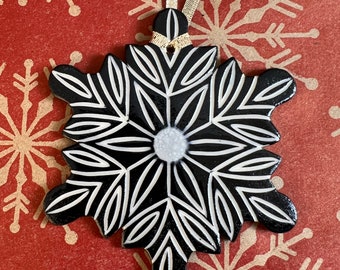 Carved porcelain snowflake ornament