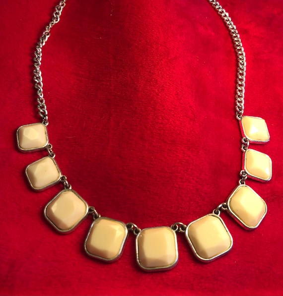 Silvertone and ivory colored statement necklace - image 1