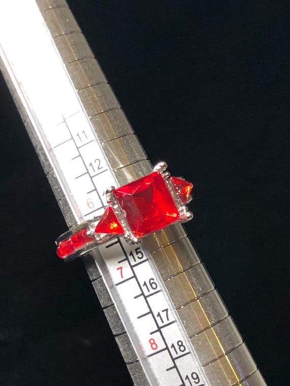 Silvertone ring with ruby red stones - image 5