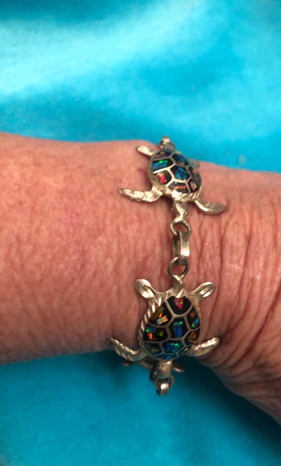 Silver multi turtle braclet featuring iridescent … - image 4