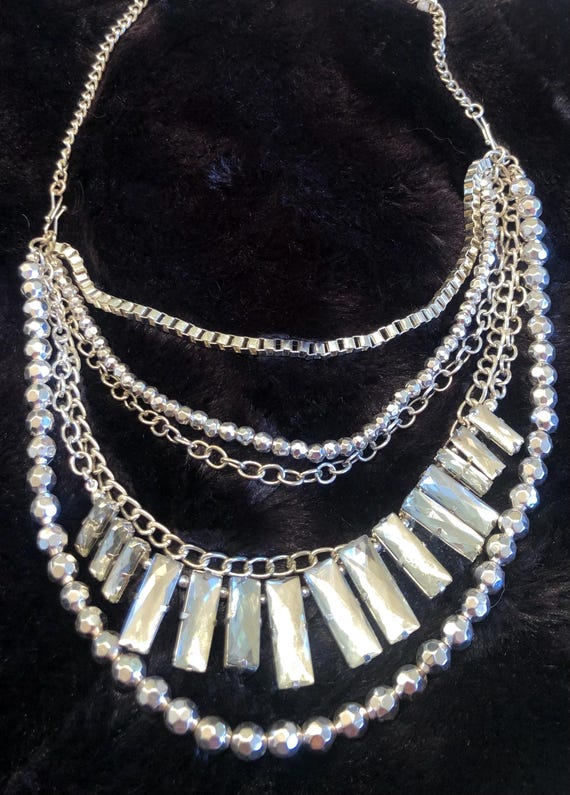 Multistrand Silvertone necklace - image 1