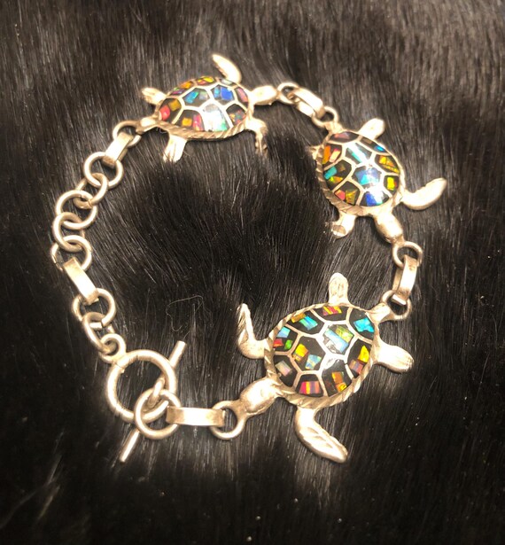 Silver multi turtle braclet featuring iridescent … - image 3