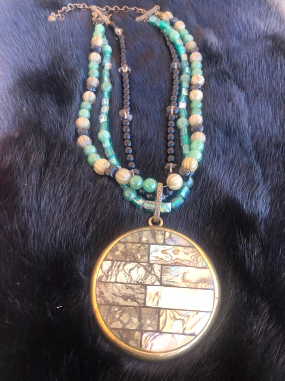 Chico brass round pendant