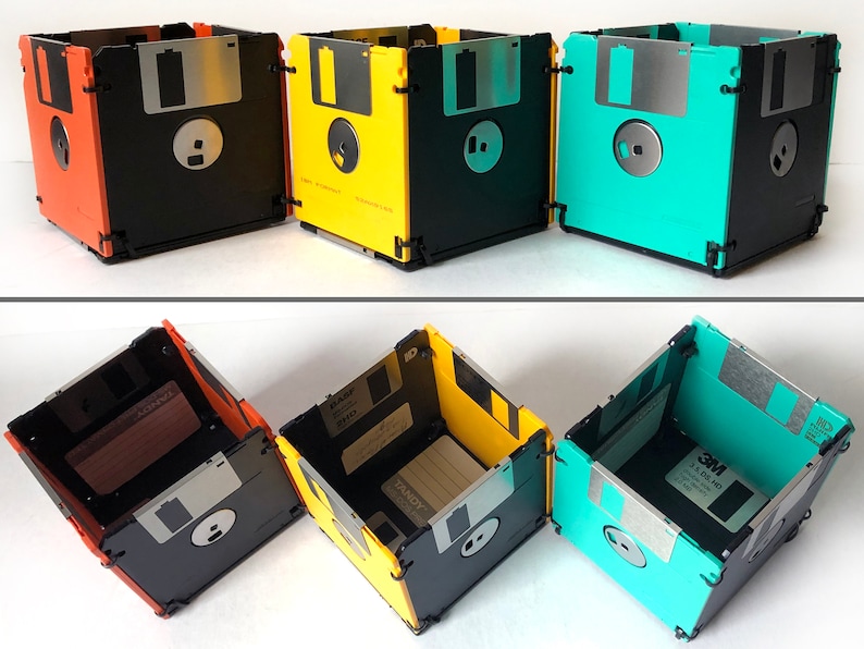 3 diskette containers shown in a split image. Horizontally across the top at eye level you see orange and black, yellow and black, and sea foam green and black. Across the bottom are the same boxes, but from an overhead view.