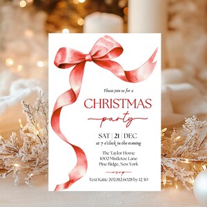 May include: A Christmas party invitation with a red watercolor bow on a white background. The text reads "Please join us for a Christmas party, Sat 21 Dec at 7 o'clock in the evening, The Taylor Home, 1002 Mistletoe Lane, Pine Ridge, New York, RSVP, Text Katie 202.812.6028 by 12/10".