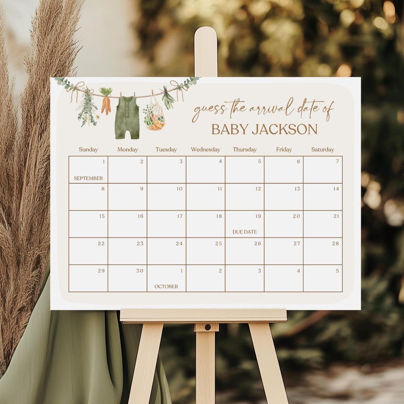 May include: A white calendar with a brown border and the text "guess the arrival date of BABY JACKSON" at the top. The calendar is for September and October, with the due date marked on September 26th.