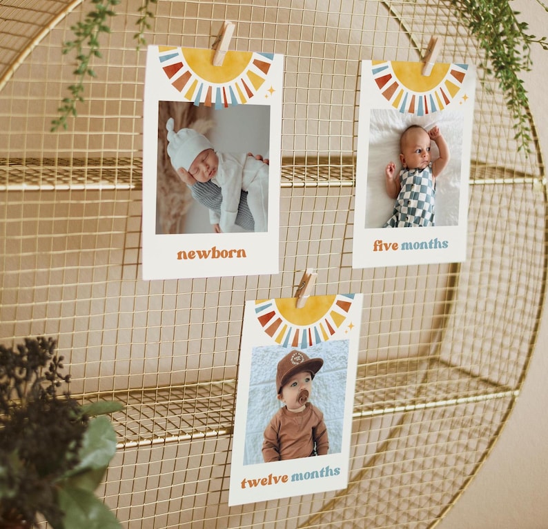 May include: Three colorful photo cards with a sunburst design and a baby's photo in each. The cards are labeled "newborn", "five months", and "twelve months".