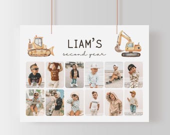 以下が含まれることがあります： 「LIAM'S second year」の文字と子供の写真が載った白いポスター。ブルドーザーと掘削機の水彩イラストが上部にあります。ポスターは細い茶色の紐から吊り下げられています。