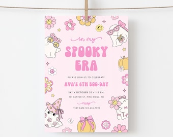 May include: A light pink rectangular invitation card featuring the text in my SPOOKY ERA, PLEASE JOIN US TO CELEBRATE AVA'S 6TH BOO-DAY, SAT OCTOBER 20 1-3 PM, 101 CENTER ST PINE RIDGE NJ, RSVP TEXT KATE 123.456.7890, surrounded by ghosts, pumpkins, and flowers.