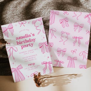 May include: Two pink birthday party invitations with bow illustrations. One invitation reads "amelia's birthday party" with event details. The other features a bow pattern on a pink background.