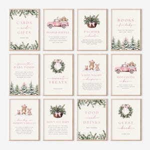 May include: Twelve framed signs with a winter theme, featuring watercolor illustrations and text in a soft pink hue. The signs include phrases like "Cards and Gifts," "Diaper Raffle," and "Hot Cocoa Bar." The signs are in a rectangular shape.