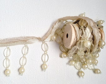 Dangling clear trim, pearl bead trim
