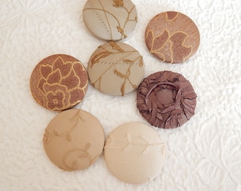 7 taupe fabric covered buttons, size 75