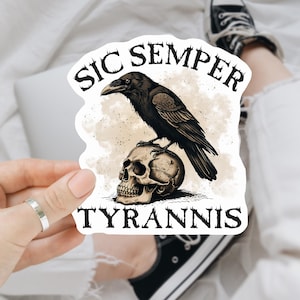 May include: A white sticker with a black raven perched on a skull. The sticker says "Sic Semper Tyrannis".