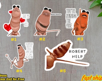 May include: A collection of five cartoon stickers featuring anthropomorphic characters with various expressions and text. The stickers include phrases like "Give Me A Kiss," "Hello Robert," and "You're Ruining The Vibe."
