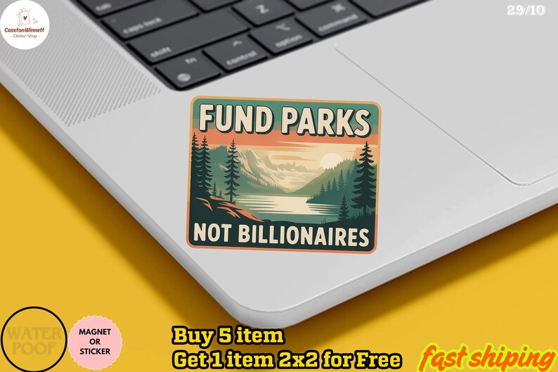 May include: A rectangular sticker with the text "FUND PARKS NOT BILLIONAIRES" in a landscape design. The design features a lake, mountains, and trees in shades of green, orange, and blue. The sticker is on a laptop.