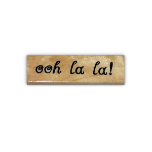 ¡Oh, la, la! Sello de goma montado, refrán francés n.° 22