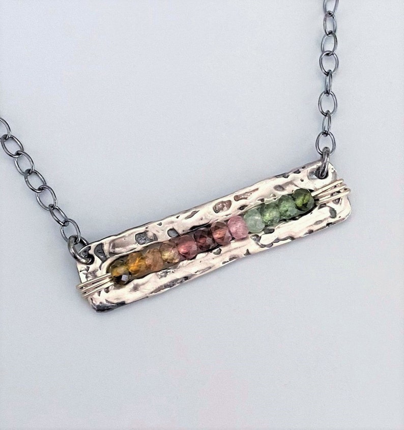 The Front Row Tourmaline rainbow - oxidized