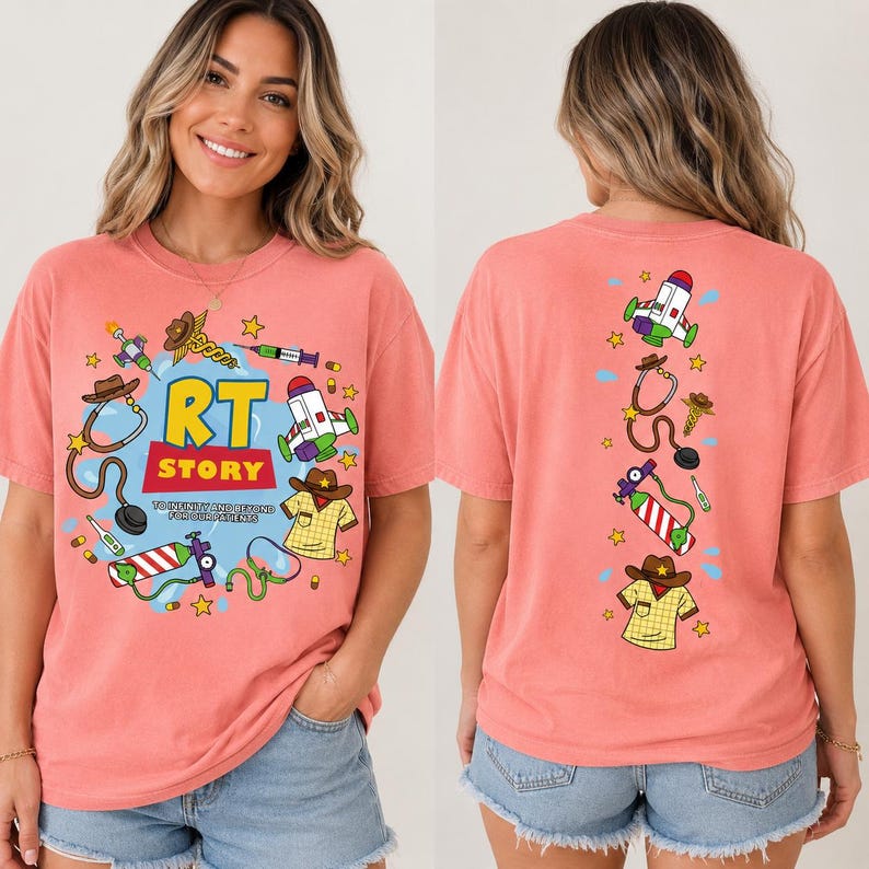 May include: A coral-colored short-sleeve t-shirt featuring a graphic print. The front displays the text RT STORY TO INFINITY AND BEYOND FOR OUR PATIENTS surrounded by illustrations of medical equipment and a cowboy hat. The back shows a vertical design.