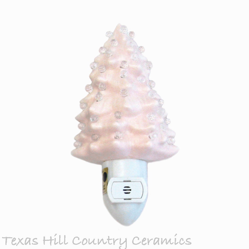 Little Pink Ceramic Christmas Tree Night Light With Clear Globe Lites Set On White Sensitive Automatic Switch Little Pink Ceramic Christmas Tree Night Light With Clear Globe Lites Set On White Sensitive Automatic Switch