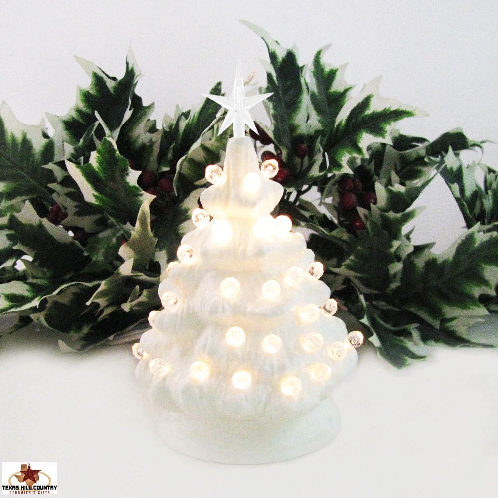 Miniature White Ceramic Christmas Tree With Clear Lights And Star 6 Inch Tall Electric Lighted Miniature White Ceramic Christmas Tree With Clear Lights And Star 6 Inch Tall Electric Lighted