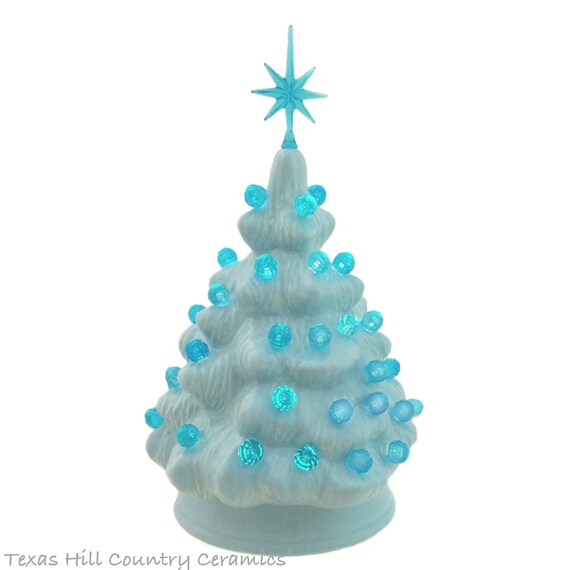 Small Light Blue Ceramic Christmas Tree With Aqua Color Lights Small Light Blue Ceramic Christmas Tree With Aqua Color Lights