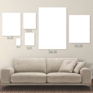 May include: A selection of blank white canvas art prints in various sizes, including 12.7x17.8cm, 20.3x25.4cm, 28x35.6cm, 40.6x50.8cm, 45.7x61cm, and 61x91.4cm. The prints are displayed above a beige sofa.