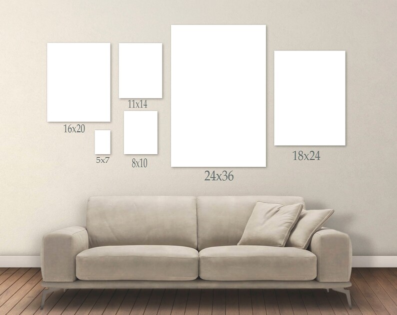 May include: A selection of blank white canvas art prints in various sizes, including 12.7x17.8cm, 20.3x25.4cm, 28x35.6cm, 40.6x50.8cm, 45.7x61cm, and 61x91.4cm. The prints are displayed above a beige sofa.