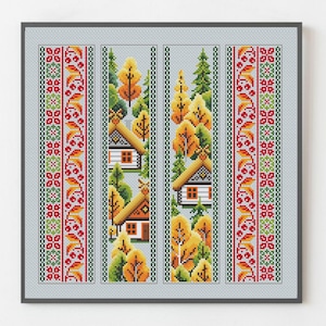 May include: Cross-stitch artwork featuring a folk art design. The piece depicts a village scene with houses and trees in autumn colors. The borders have a floral pattern in red, green, and orange.