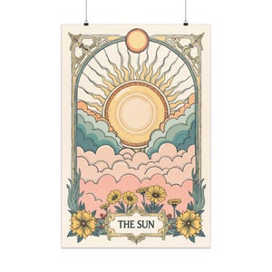 May include: A vintage-style tarot card illustration of the Sun card. The card features a large sun with rays emanating from it, surrounded by clouds in shades of blue, green, and pink. The sun is set against a yellow background, and the card is framed with a decorative border. The text "THE SUN" is written in a gold font at the bottom of the card.