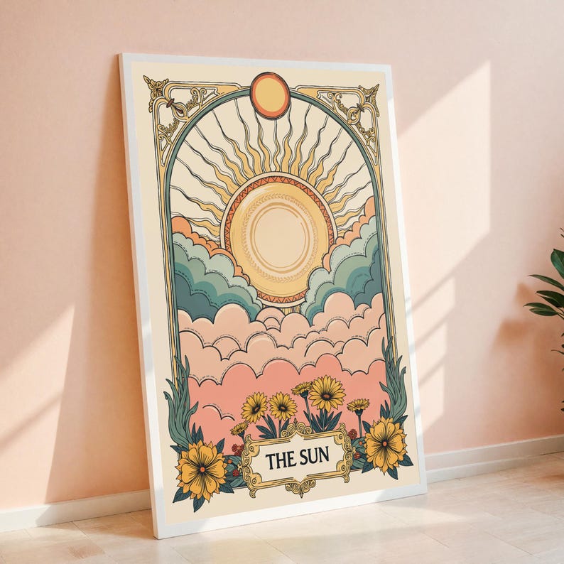 May include: A vintage-style tarot card illustration of the Sun card. The card features a large sun with rays, surrounded by clouds in shades of pink, blue, and green. The card is framed with a decorative border and includes the text "THE SUN" at the bottom.