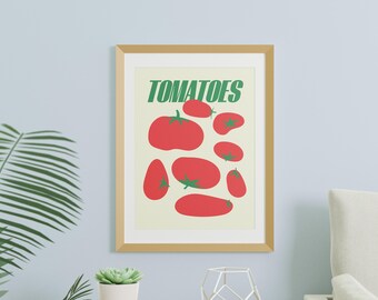 May include: A framed print with a white background and the word "TOMATOES" in green letters. The print features a stylized illustration of red tomatoes in various shapes and sizes.