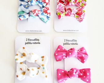 2 Small bow barrettes