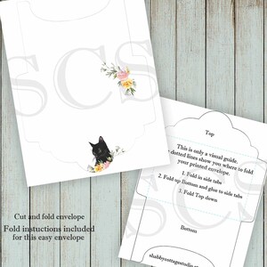 May include: Printable DIY envelope template featuring a black cat with floral accents. Instructions for folding and gluing the envelope are included. The text "This is only a visual guide. Dotted lines show you where to fold your printed envelope." is included.