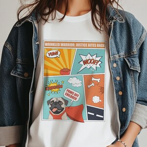 パグのスーパーヒーロー漫画風おもしろユニセックスTシャツ。犬の飼い主やペット愛好家へのギフト