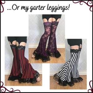 May include: Three pairs of black and white striped leggings with black lace trim. The leggings have a garter belt attached to the top. The leggings are shown in red and white, black and white, and purple and black.