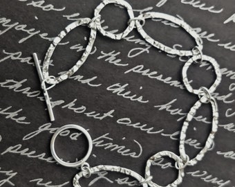 Links - hammered hoop sterling silver bracelet