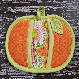 Bold and bright Fall pumpkin hot pad