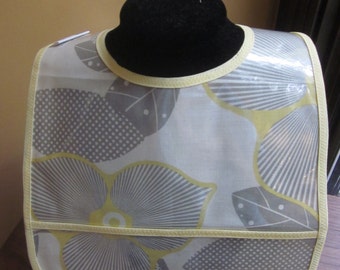 CLEARANCE Waterproof Wipeable Baby or Toddler Plastic Coated Bib Yellow and Gray Large Floral Print