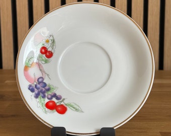 Sous-tasse porcelaine blanc, motif fruits et liseré doré. Vintage 1990.