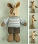 Toy knitting pattern for a bunny rabbit with a piebald patch, shorts and a stripy sweater (9 inches tall) 