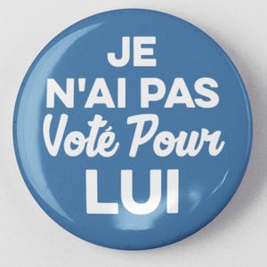 May include: A blue button with white text that reads "JE N'AI PAS Voté POUR LUI".